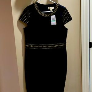 Little black dress with grommets
